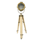 An adjustable tripod spotlight lamp with a beige aluminum body and a wooden tripod stand, featuring a lens at the top and a spike for outdoor use.